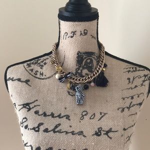 Teddy bear necklace.